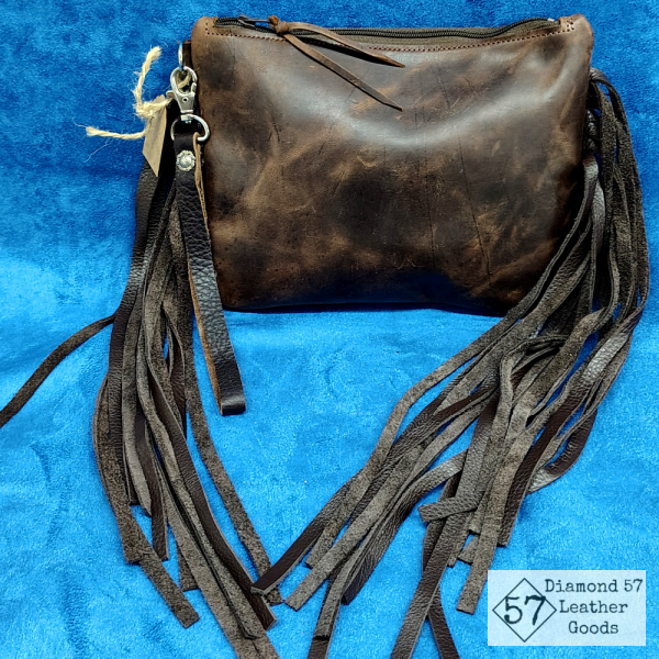 Brown leather clutch purse wristlet