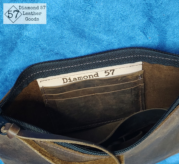 Brown leather clutch purse with wristlet