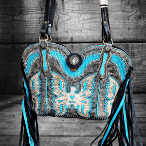 Rustic black and turquoise cowboy boot purse with inlay eagle and leather fringe.