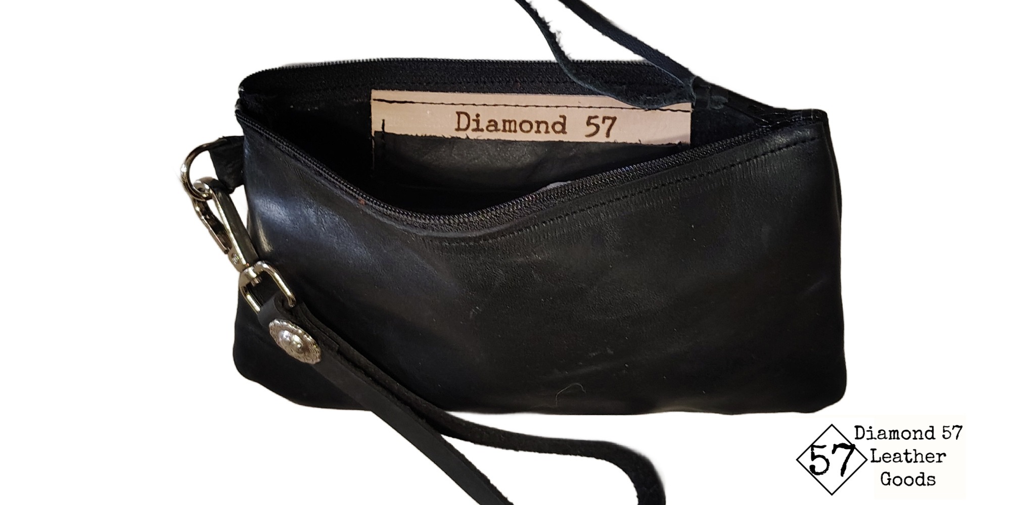 Black leather zipper wallet with credit card wallet slots inside. Strap with concho.