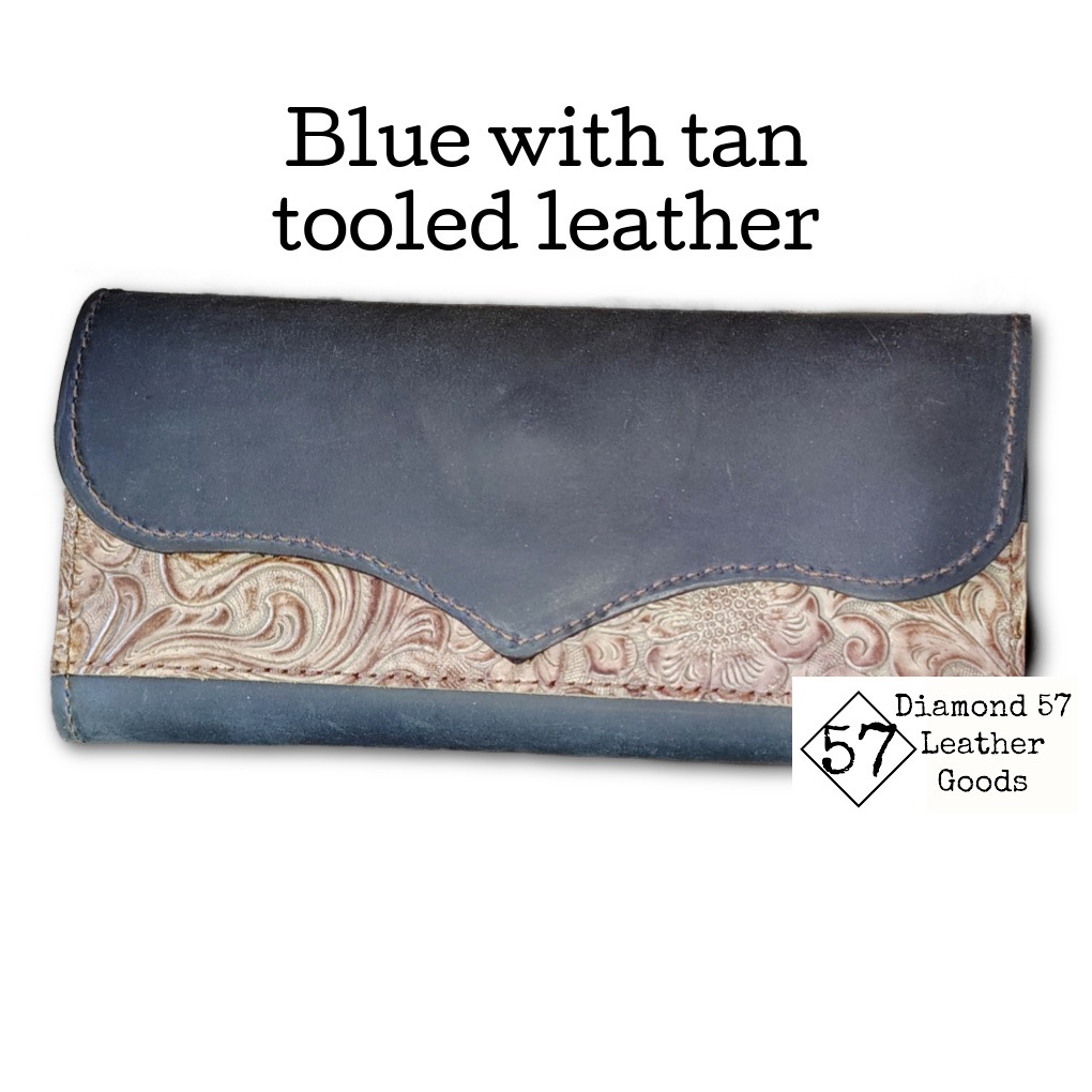 Blue western leather wallet with tan tooled leather accents and strong magnetic snap closure.